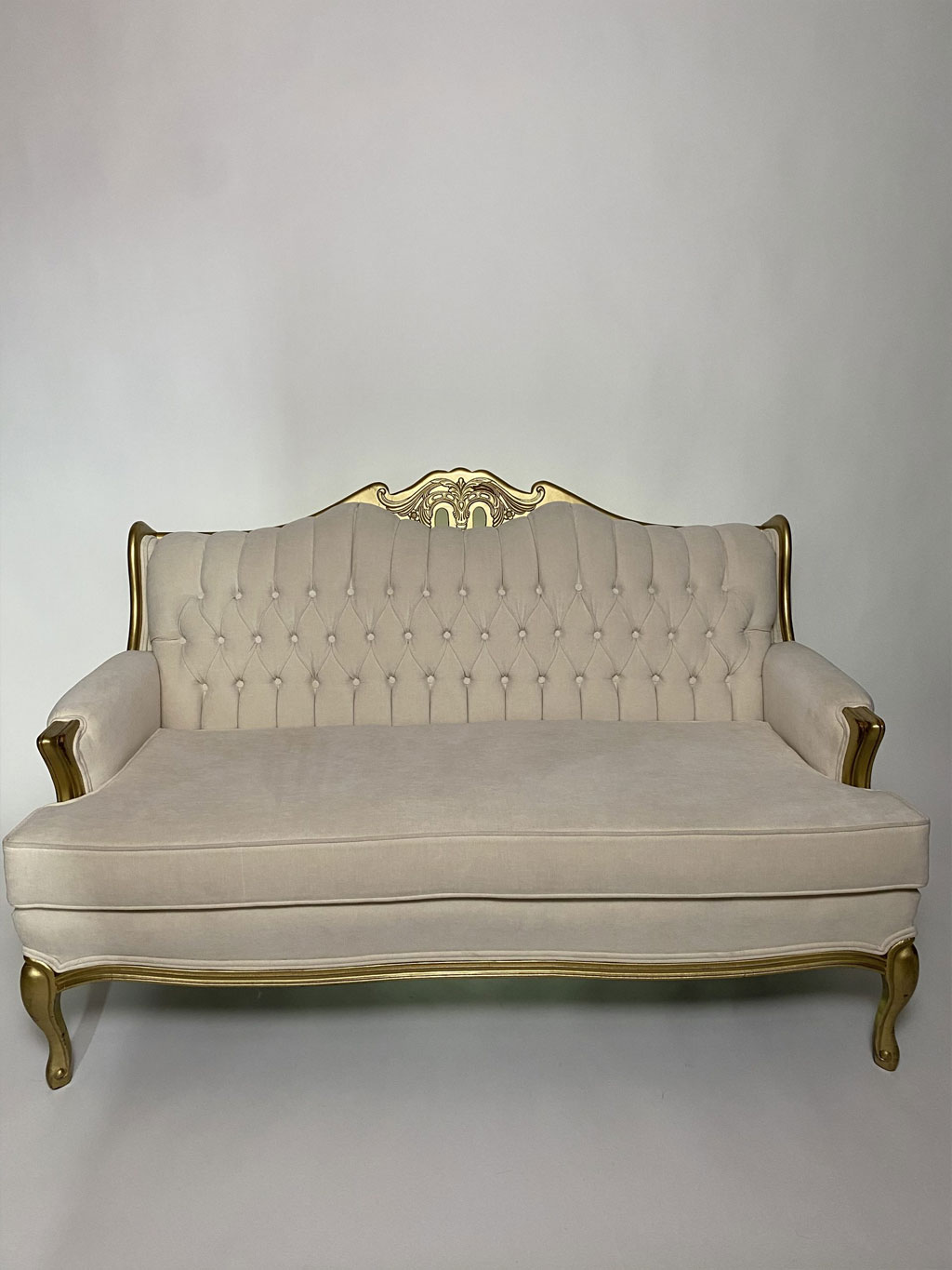 Professionally upholstered in Diamond Tufting with Gold Trim